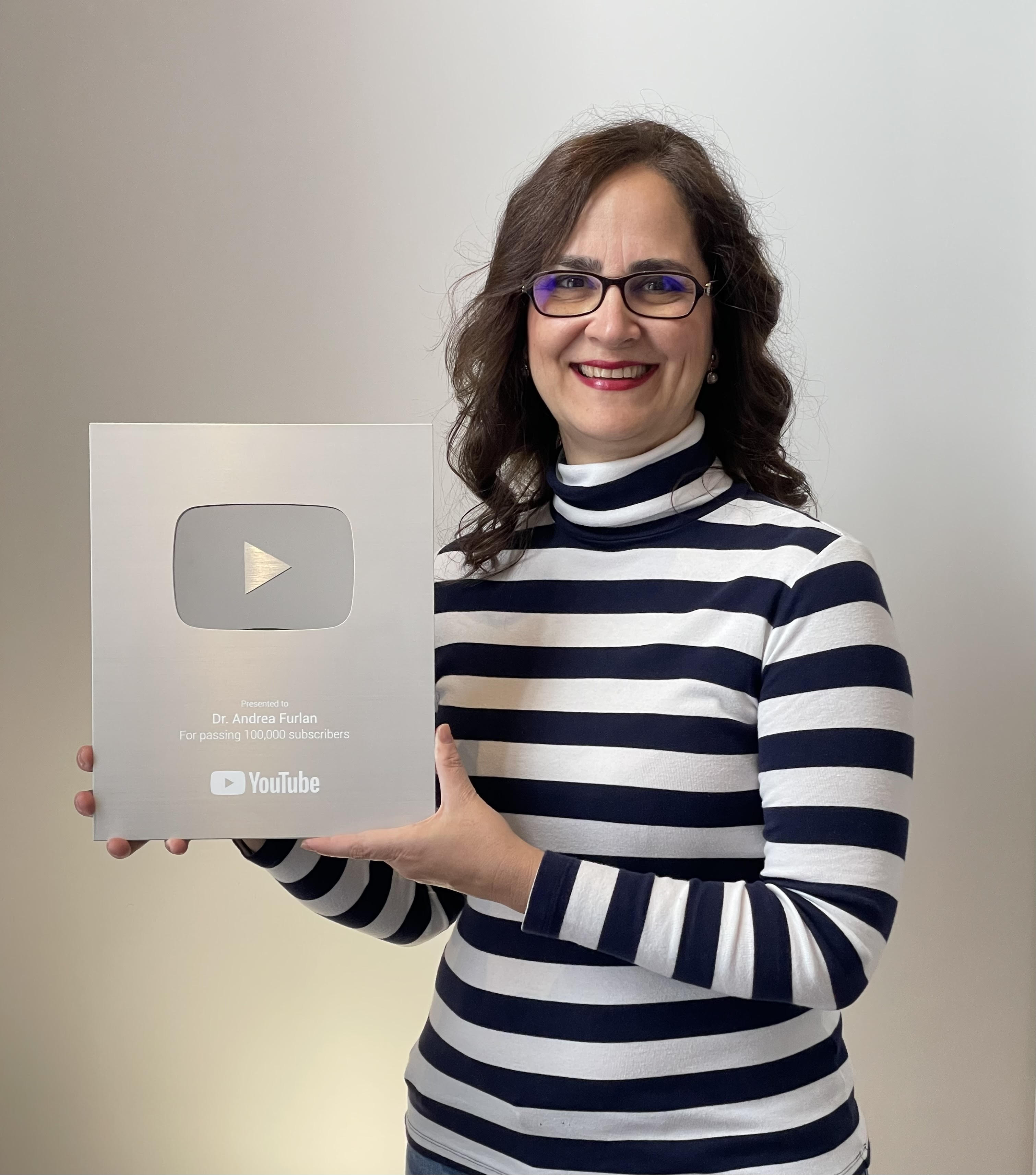 Student with YouTube play button