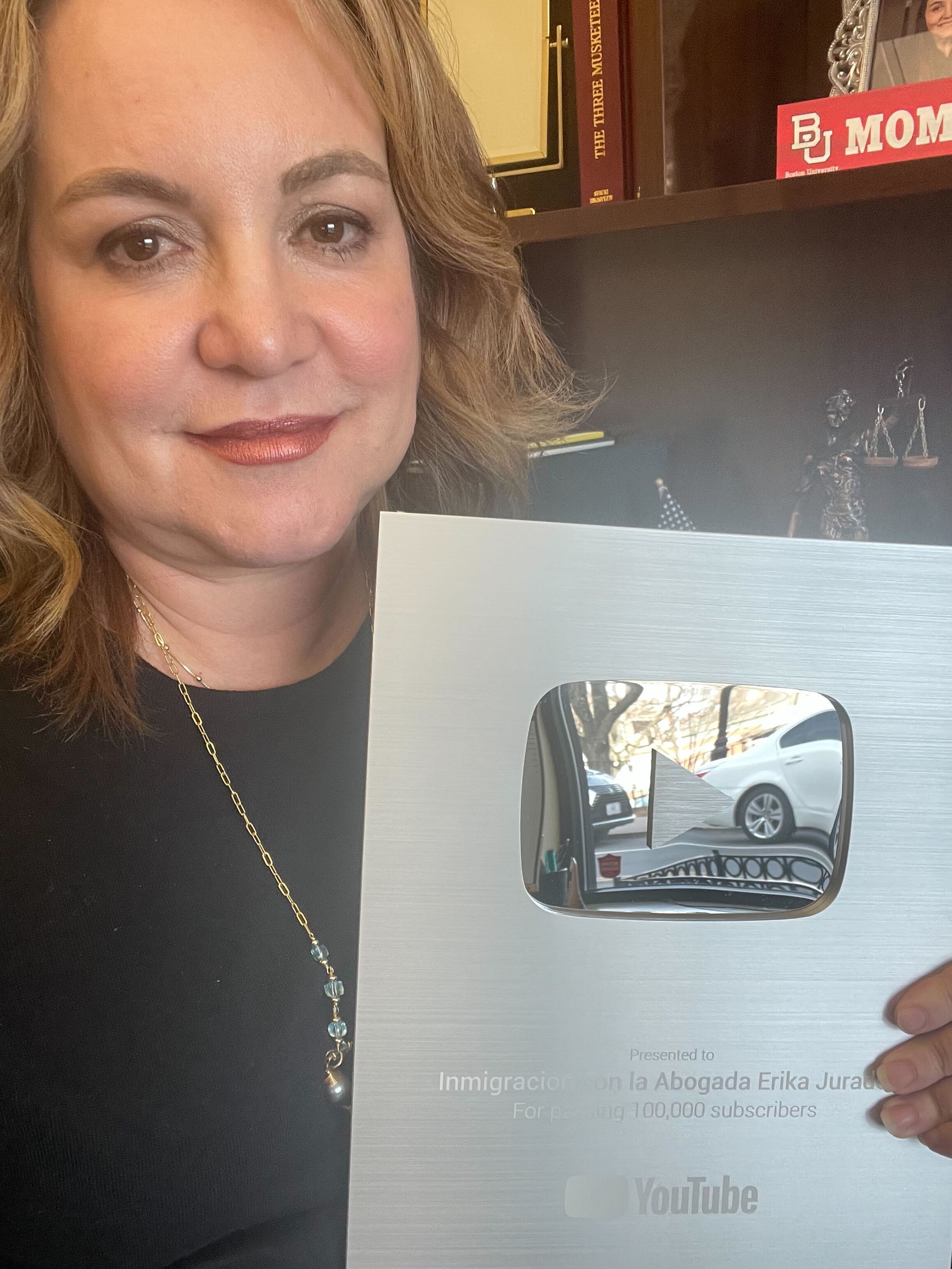 Student with YouTube play button