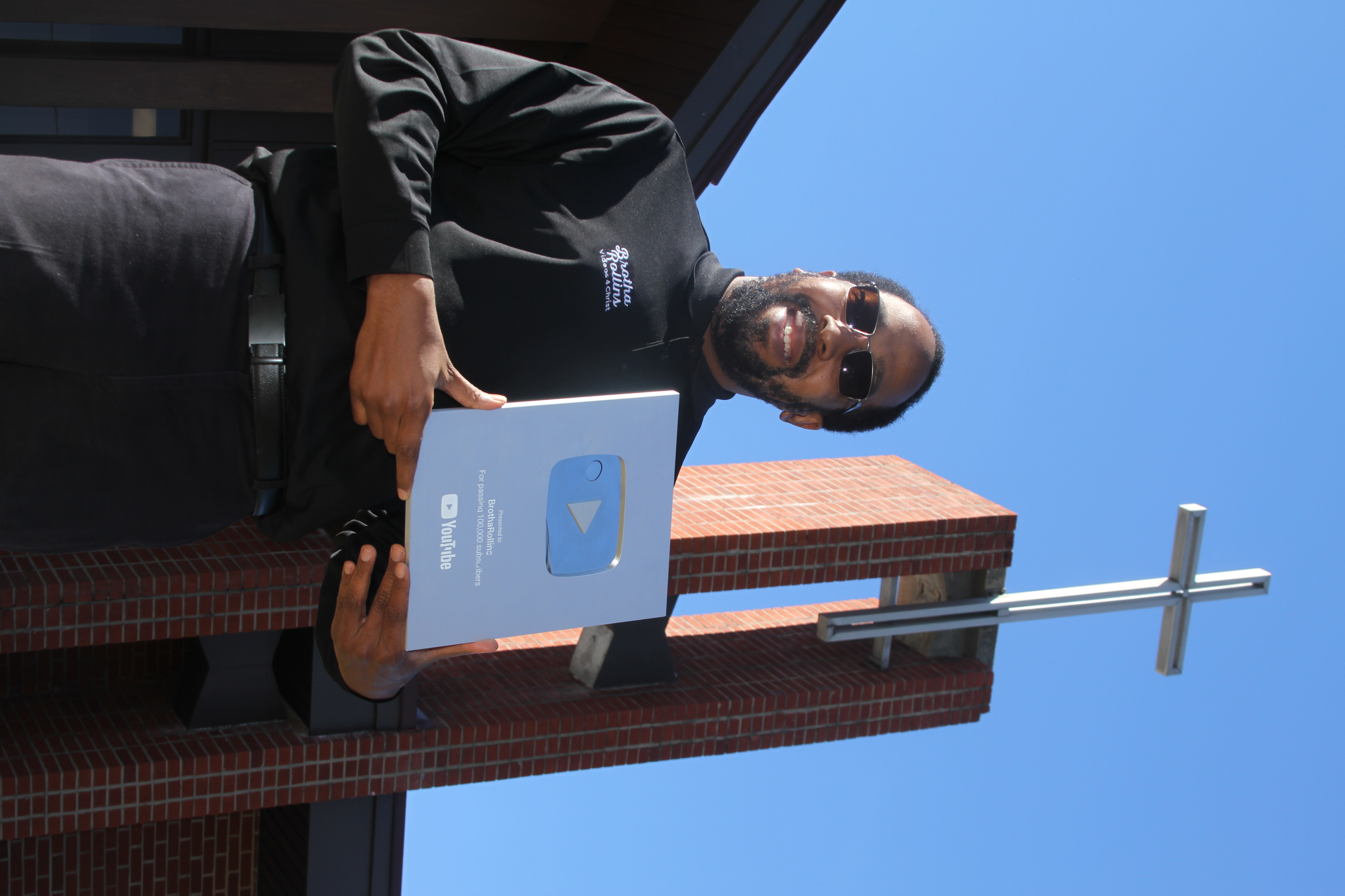 Student with YouTube play button